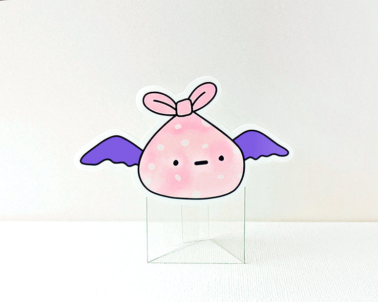 Cute pink sack thingy with purple wings
