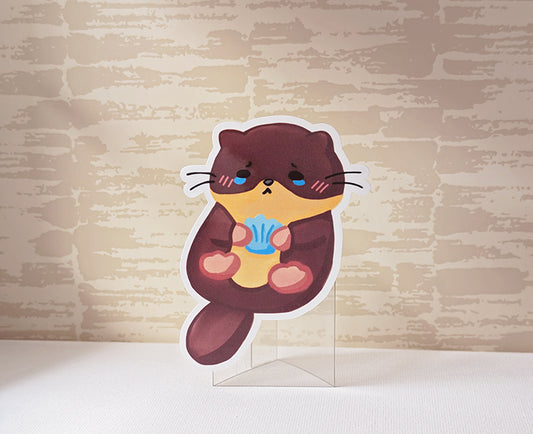 Otter Clutching A Blue Seashell Sticker