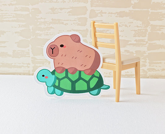 Cuddly Capybara On A Calm Turtle Sticker